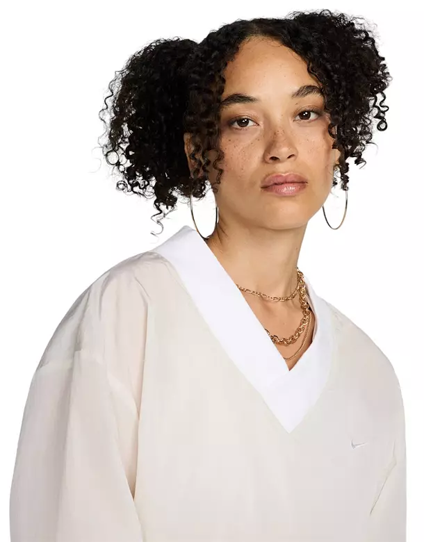 Nike Women's Sportswear Essential Loose UV Woven Long-Sleeve V-Neck Top